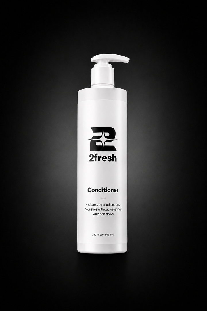 A tall white pump bottle of 2fresh Conditioner centered on a black gradient background.