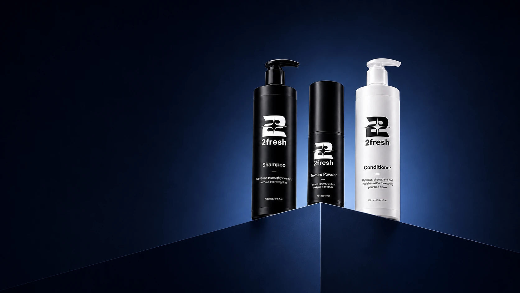 2Fresh Shampoo, Texture Powder and Conditioner on navy display blocks