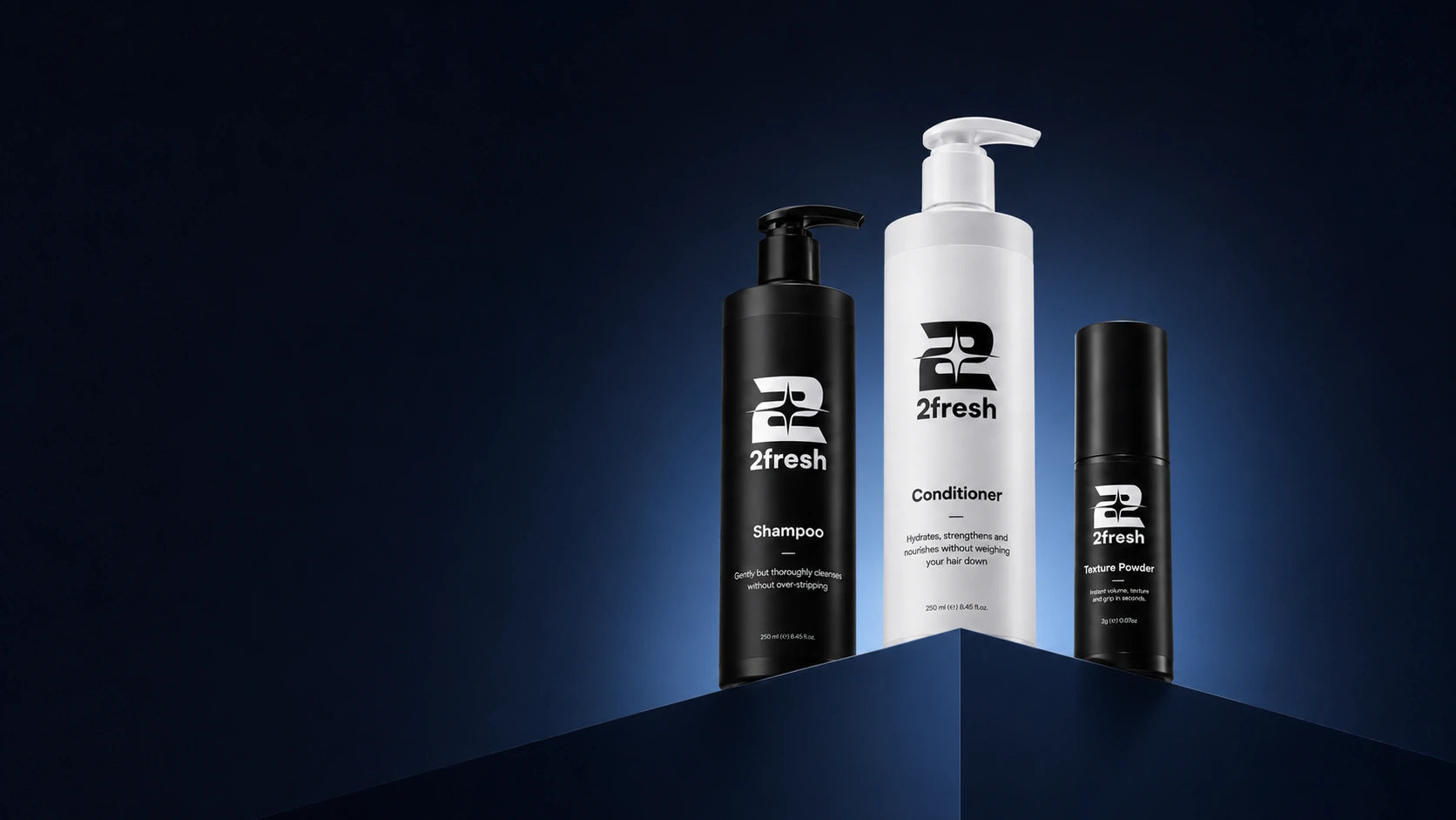 2Fresh Shampoo, Texture Powder and Conditioner on navy display blocks